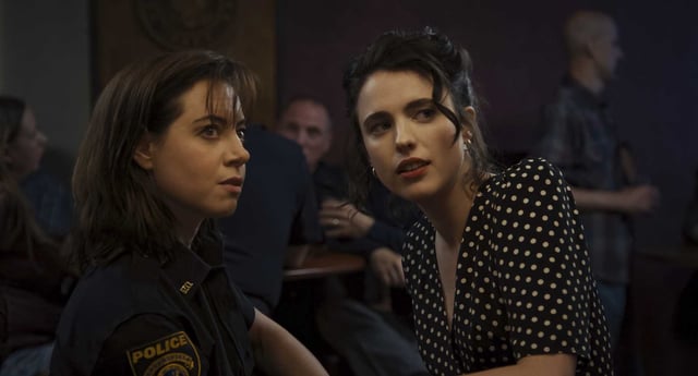 Aubrey Plaza, left, and Margaret Qualley in a scene from “Honey Don’t!” 