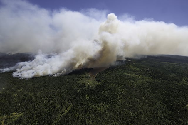 Smoke from the Long Lake wildfire billows into the air.
