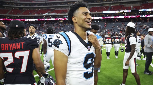 Aug 16, 2025; Houston, Texas, USA; Carolina Panthers quarterback Bryce Young (9) smiles on the field after the game against the Houston Texans at NRG Stadium. Mandatory Credit: Troy Taormina-Imagn Images