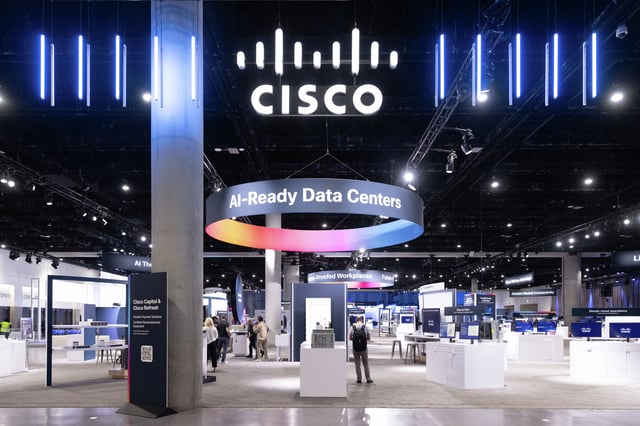 A display at Cisco Live San Diego 2025. The tech giant announced it will eliminate 221 positions at its Milpitas and San Francisco offices this fall. 