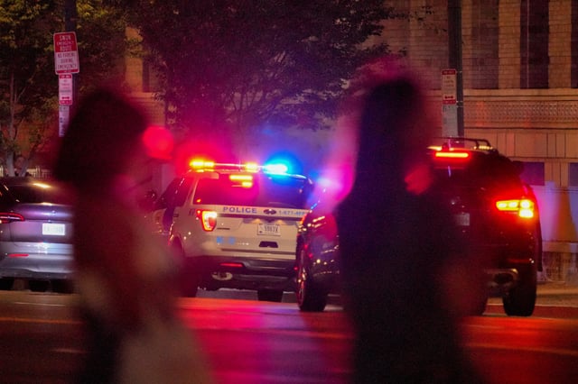 A Metropolitan police vehicle is parked near 14th Street SW and Independence Avenue SW, after U.S. President Donald Trump ordered an increased federal security presence due to crime rates in Washington, D.C., U.S., August 8, 2025. REUTERS/Ken Cedeno/File Photo