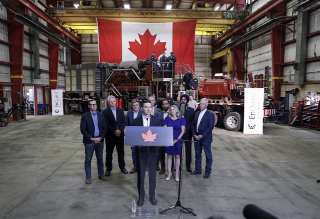 Federal Conservative Leader Pierre Poilievre, centre, speaks at a news conference in Calgary, on Thursday, Aug. 7, 2025. THE CANADIAN PRESS/Jeff McIntosh
