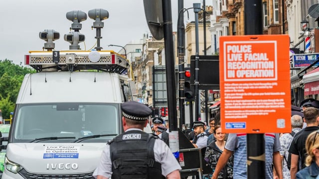 Metropolitan Police officers use a suveillance van with Live Facial Recognition on Edgeware Road in London
