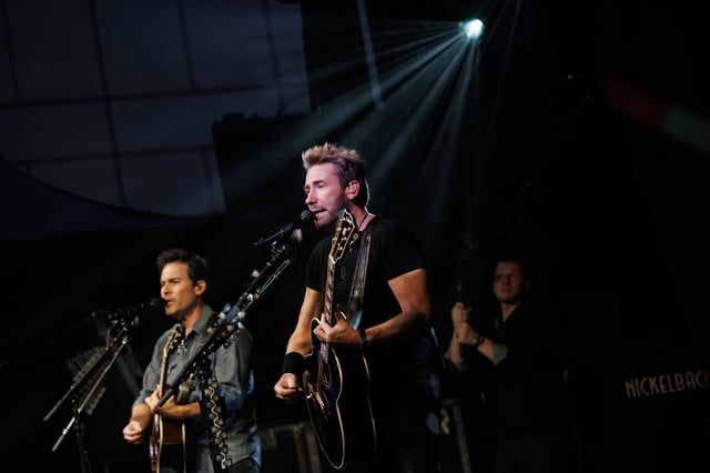 Chad Kroeger of Nickelback performs alongside Ryan Peake as the band performs during the Toronto International Film Festival on Friday, Sept. 8, 2023. THE CANADIAN PRESS/Cole Burston