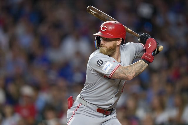 CHICAGO, ILLINOIS - AUGUST 4: Jake Fraley #27 of the Cincinnati Reds bats in a game against the Chicago Cubs at Wrigley Field on August 4, 2025 in Chicago, Illinois.