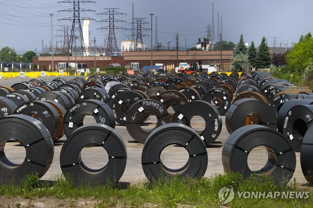 This photo, released by AFP, shows coils of steel in a yard outside ArcelorMittal Dofasco's steel manufacturing facility in Hamilton, Ontario, Canada, on June 4, 2025. (Yonhap)