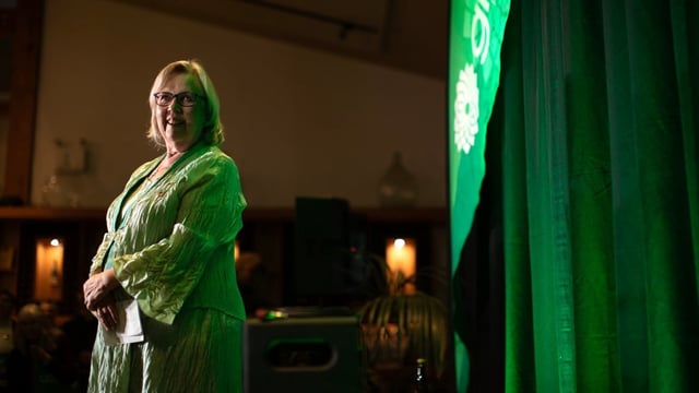 Elizabeth May says she intends to stay on as Green Party leader for now, but won't lead the party into the next federal election.