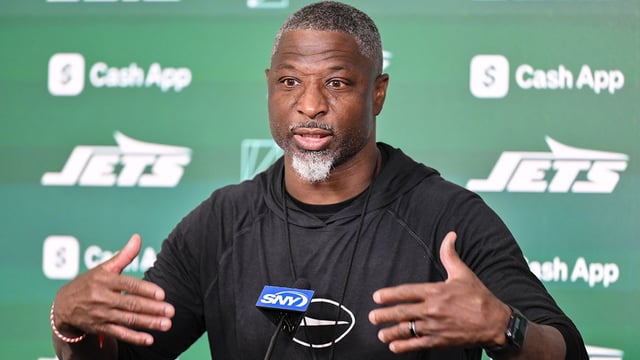 Jun 10, 2025; East Rutherford, NJ, USA; New York Jets head coach Aaron Glenn speaks at a press conference during minicamp at Atlantic Health Jets Training Center. Mandatory Credit: John Jones-Imagn Images