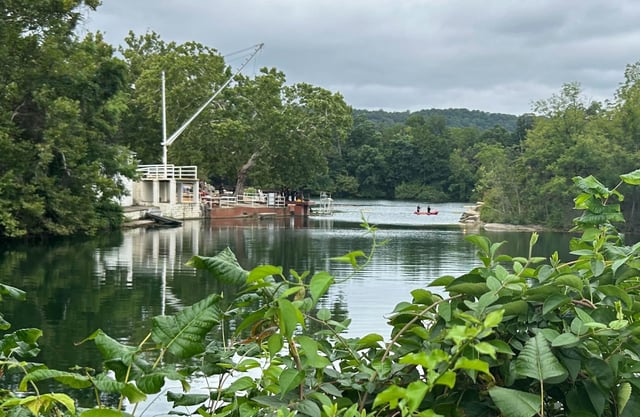 Search crews on the water trying to find a 36-year-old man who went missing Sunday while swimming at Beaver Dam Swimming Club in Cockeysville. (Racquel Bazos/Staff)