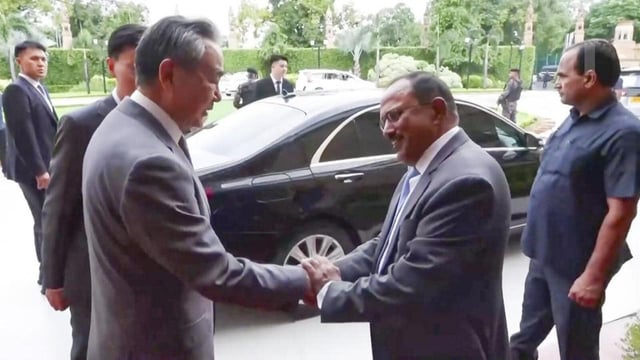 National Security Advisor Ajit Doval with China's Foreign Minister Wang Yi in New Delhi on Tuesday. (PTI)