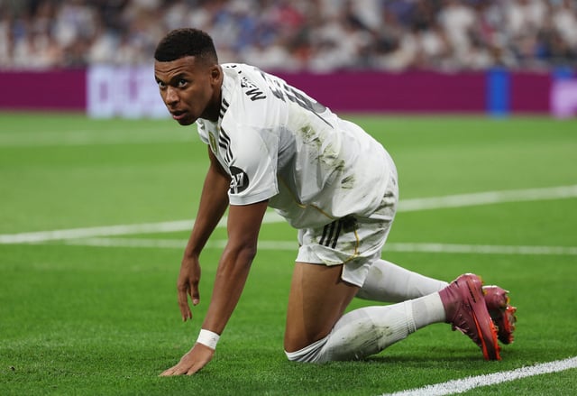 Soccer Football - LaLiga - Real Madrid v Osasuna - Santiago Bernabeu, Madrid, Spain - August 19, 2025 Real Madrid's Kylian Mbappe wins a penalty REUTERS/Violeta Santos Moura