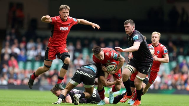 Cardiff and Ospreys in action — two of the four regional sides, along with Dragons and Scarlets that were created in 2003