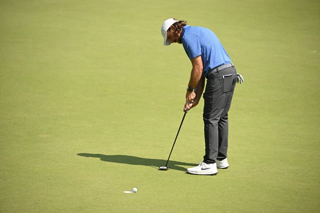Aug 17, 2025; Owings Mills, Maryland, USA; Tommy Fleetwood misses a putt on the ninth hole during the final round of the BMW Championship golf tournament. Mandatory Credit: Rafael Suanes-Imagn Images