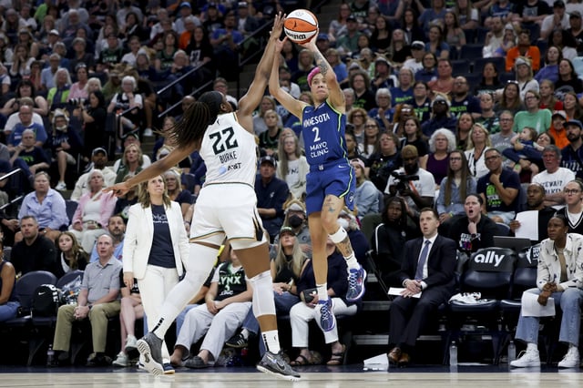 Natisha Hiedeman #2 of the Minnesota Lynx shoots against Kennedy Burke #22 of the New York Liberty during the third quarter at Target Center on August 16, 2025 in Minneapolis, Minnesota.
