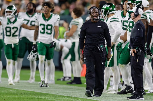 New York Jets head coach Aaron Glenn reacts to a call on the field during a preseason NFL football game between the Green Bay Packers and New York Jets Saturday, Aug. 9, 2025, in Green Bay, Wis. (AP Photo/Matt Ludtke)
