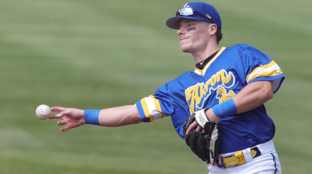 RubberDucks second baseman Travis Bazzana throws to first base to retire an Altoona Curve runner on April 13, 2025, in Akron, Ohio.
