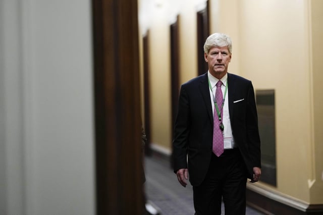 Minister of Energy and Natural Resources Tim Hodgson arrives for a meeting of the federal cabinet in West Block on Parliament Hill in Ottawa on Wednesday, May 14, 2025. THE CANADIAN PRESS/Justin Tang