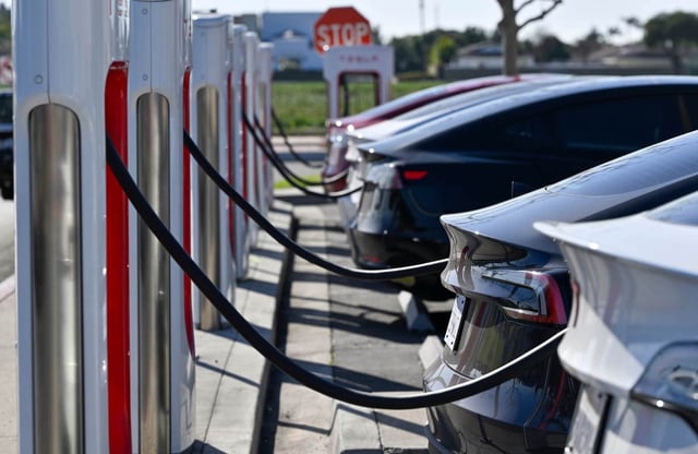 Drivers charge their Teslas in Fountain Valley, CA, on Wednesday, March 20, 2024. The Biden administration on Wednesday, March 20, 2024, issued one of the most significant climate regulations in the nation’s history, a rule designed to ensure that the majority of new passenger cars and light trucks sold in the United States are all-electric or hybrids by 2032.  (Photo by Jeff Gritchen, Orange County Register/SCNG)