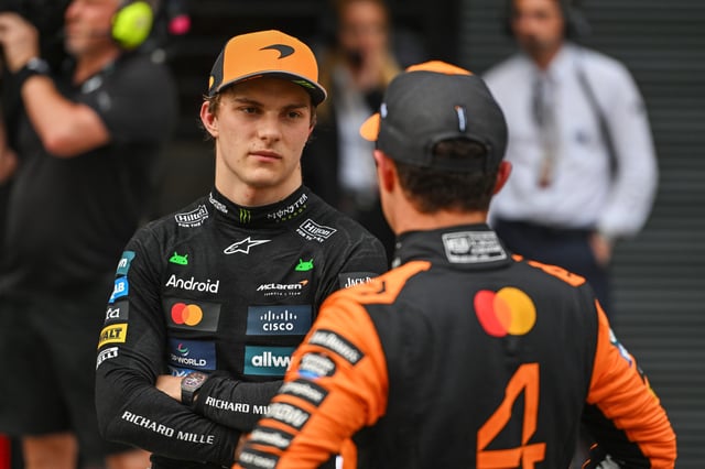 Second placed qualifier Oscar Piastri of Australia and McLaren and Third placed qualifier Lando Norris of Great Britain and McLaren talk in parc ferme during qualifying ahead of the F1 Grand Prix of Hungary at Hungaroring on August 02, 2025 in Budapest, Hungary.