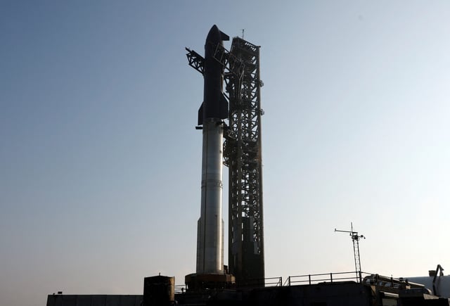 SpaceX's Super Heavy booster is seen TMonday, May 26 on the launch pad, with Starship atop as it is prepared for its ninth mission targeted for May 27 from the company's Starbase launchpad on an uncrewed test flight.