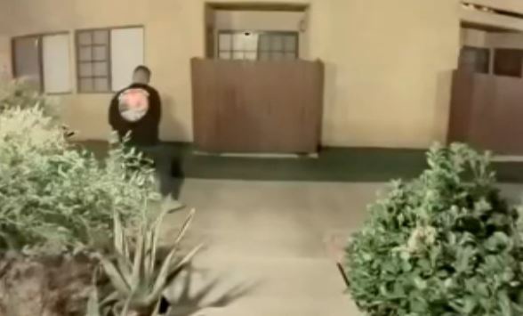 Security camera video showed the husband of a missing woman found dead in Angeles National Forest dragging what appeared to be a large object from their apartment.

