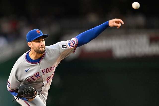 New York Mets starting pitcher David Peterson throws during the second inning of a baseball game against the Washington Nationals Tuesday, Aug. 19, 2025, in Washington. (AP Photo/John McDonnell)