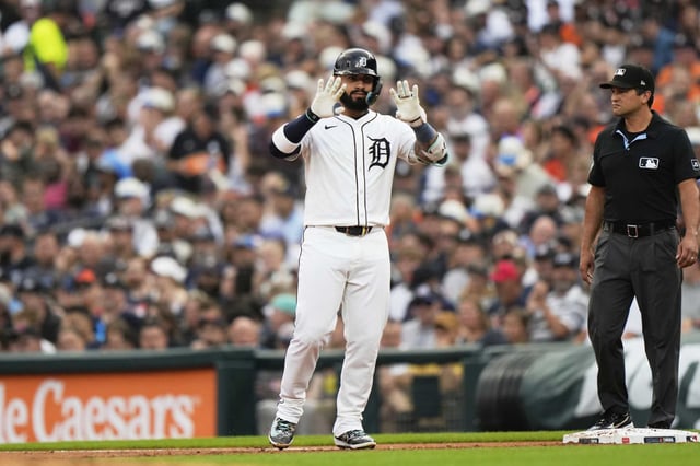 Detroit Tigers' Gleyber Torres reacts after hitting a single during the first inning of a baseball game against the Houston Astros, Tuesday, Aug. 19, 2025, in Detroit. (AP Photo/Ryan Sun)