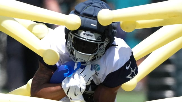 Jul 27, 2025; Oxnard, CA, USA; Dallas Cowboys running back Jaydon Blue (34) carries the ball at training camp at the River Ridge Fields. Mandatory Credit: Kirby Lee-Imagn Images