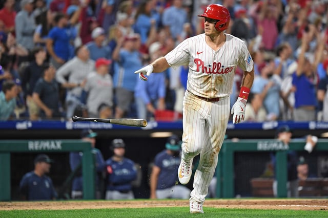 Aug 19, 2025; Philadelphia, Pennsylvania, USA; Philadelphia Phillies catcher J.T. Realmuto (10) celebrates his two-run home run during the eighth inning against the Seattle Mariners at Citizens Bank Park. Mandatory Credit: Eric Hartline-Imagn Images