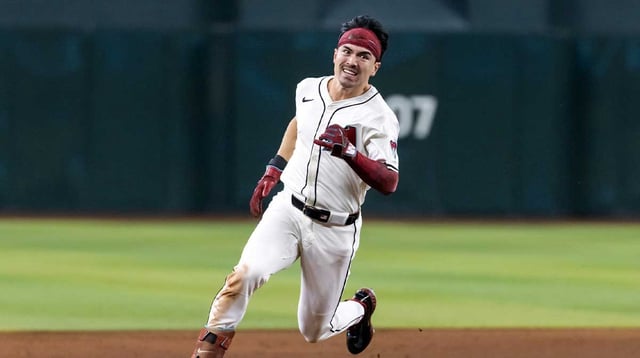 Aug 19, 2025; Phoenix, Arizona, USA; Arizona Diamondbacks outfielder Corbin Carroll runs to third after hitting an RBI triple in the fifth inning against the Cleveland Guardians at Chase Field. Mandatory Credit: Mark J. Rebilas-Imagn Images