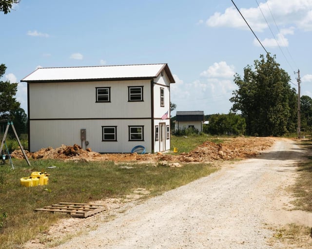 A home at Return to the Land, a community in rural Ravenden, Ark., where white nationalists are testing anti-discrimination housing laws by barring non-white, non-heterosexual residents, on Aug. 11, 2025. Housing rights experts say a community restricted to white residents is illegal, but the creators believe they could win a potential challenge in court in the current political climate. (Whitten Sabbatini/The New York Times)