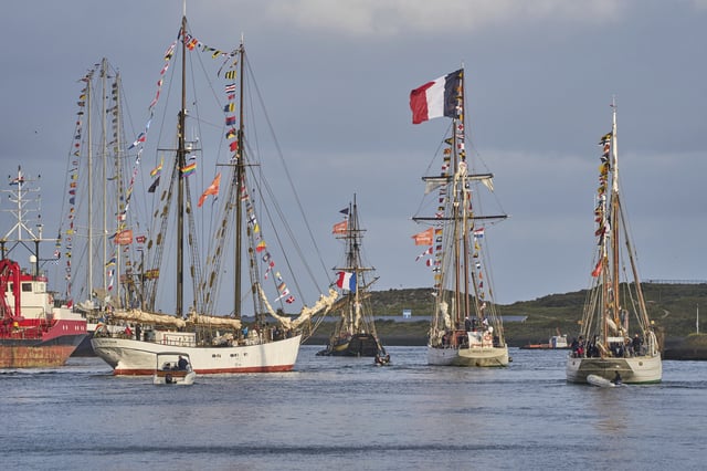 Hundreds of tall ships sailed into the Dutch capital's harbor for the 10th edition of SAIL, in Amsterdam, Netherlands, Wednesday, Aug. 20, 2025. (AP Photo/Peter Dejong)