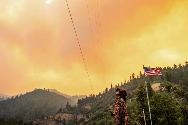The Dixie Fire burns along Highway 70 in Plumas National Forest in July 2021. Researchers studying the burn patterns from in the forest determined that timber plantations can increase the propensity for severe burning.