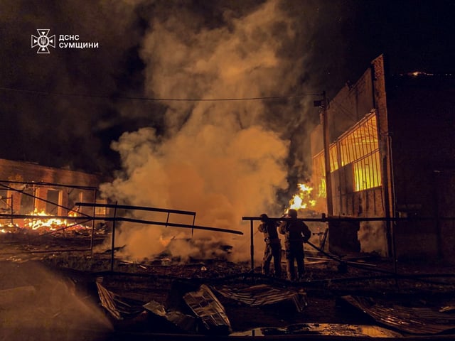 A picture that Zelensky posted on X shows Ukrainian rescue workers at an unidentified location in the aftermath of a Russian attack.