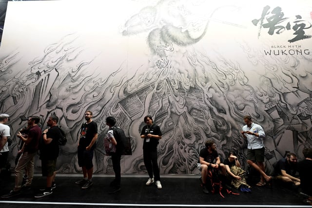 People wait in queue to play the "Black Myth: Wukong" video game at Gamescom 2023, a computer and video game industry event, in Cologne, Germany, August 23, 2023. REUTERS/Jana Rodenbusch/File Photo