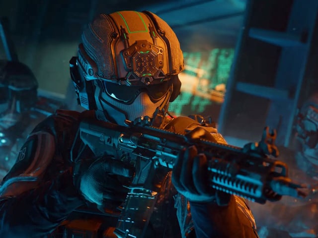 Black Ops 7 weapon prestige attachments and weekly challenges: A group of soldiers sneaking through a dark corridor with weapons at the ready.