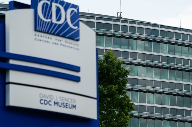 Bullet holes are seen in windows at the Centers For Disease Control (CDC) Global Headquarters following a shooting that left two dead, on August 9, 2025 in Atlanta, Georgia.