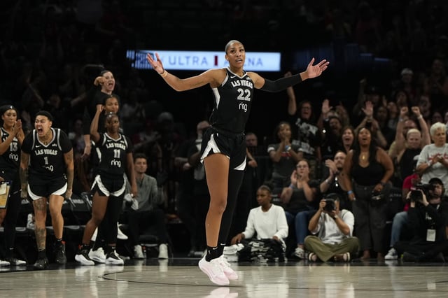 Aug 19, 2025; Las Vegas, Nevada, USA; Las Vegas Aces center A'ja Wilson (22) reacts after scoring against the Atlanta Dream during the second half of a WNBA basketball game at Michelob Ultra Arena. Mandatory Credit: Lucas Peltier-Imagn Images