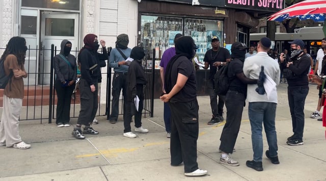 Crown Heights Bites Back members shoved a Jewish man that attempted to approach their vigil for Gavin Cato on August 19, 2025. (Grace Gilson)