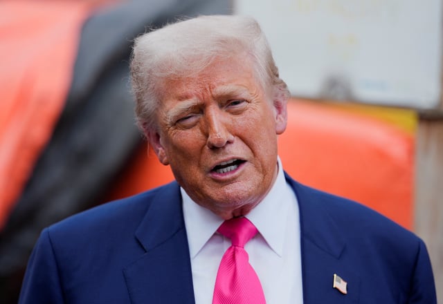 U.S. President Donald Trump speaks to the media during a tour of the Federal Reserve Board building, which is currently undergoing renovations, in Washington, D.C., U.S., July 24, 2025. REUTERS/Kent Nishimura/File Photo