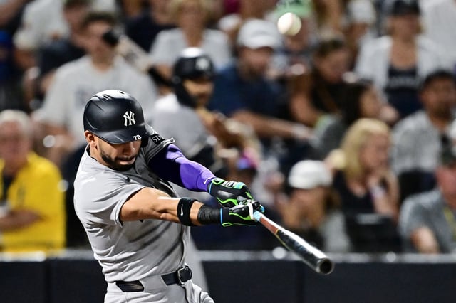 TAMPA, FLORIDA - AUGUST 19: José Caballero #72 of the New York Yankees hits a two-run home run in the second inning against the Tampa Bay Rays at George M. Steinbrenner Field on August 19, 2025 in Tampa, Florida. (Photo by Julio Aguilar/Getty Images)
