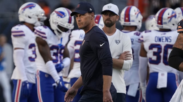 Aug 17, 2025; Chicago, Illinois, USA; Chicago Bears head coach Ben Johnson on the field before a game against the Buffalo Bills at Soldier Field. Mandatory Credit: David Banks-Imagn Images