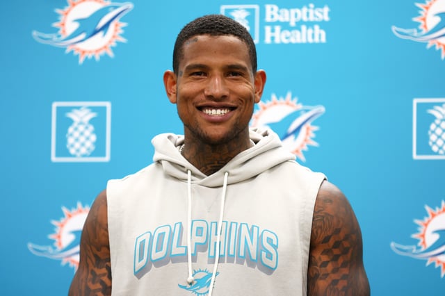 MIAMI GARDENS, FLORIDA - JULY 22: Darren Waller #83 of the Miami Dolphins speaks to the media during Miami Dolphins Training Camp at Baptist Health Training Complex on July 22, 2025 in Miami Gardens, Florida.