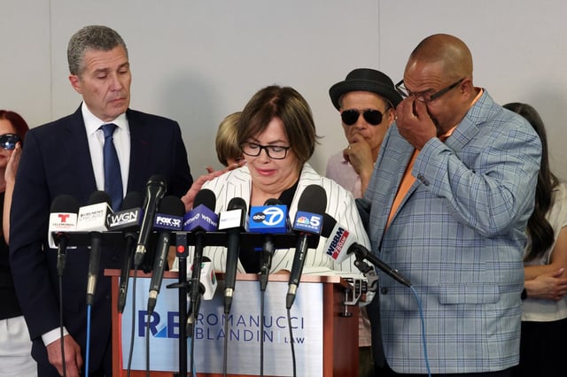 Yolanda Rivera, center, calls for greater transparency in the investigation into the shooting death of her daughter, Chicago police Officer Krystal Rivera, as attorney Antonio Romanucci, left, and Krystal’s step-father Rico Thompson listen at the Chicago law office of Romanucci & Blandin on July 2, 2025. (Terrence Antonio James/Chicago Tribune)