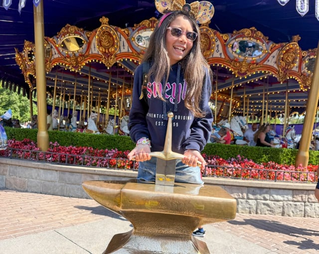 Bella Batteau-Bristol tries, but fails, to pull the Sword in the Stone during the 70th anniversary Disneyland on July 17, 2025, ￼ in Anaheim, CA. ￼ (Photo by Jeff Gritchen, Orange County Register/SCNG)