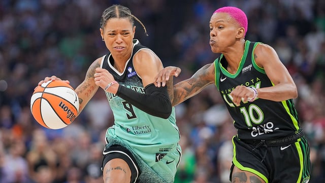 Jul 30, 2025; Minneapolis, Minnesota, USA; New York Liberty guard Natasha Cloud (9) dribbles against the Minnesota Lynx guard Courtney Williams (10) in the fourth quarter at Target Center. Mandatory Credit: Brad Rempel-Imagn Images