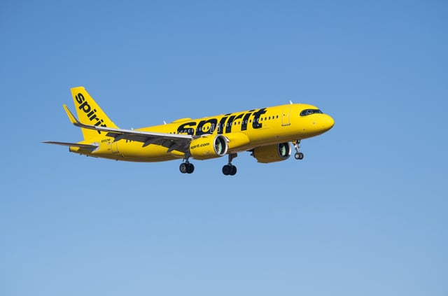 A stock photo shows a Spirit Airlines plane.