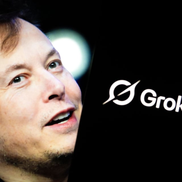 elon musk in front of phone with grok logo