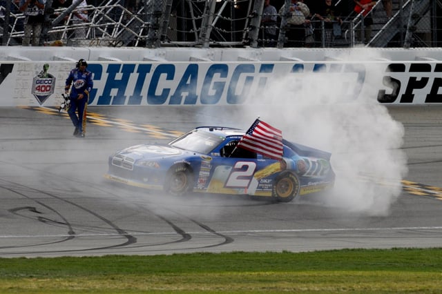 Brad Keselowski driver of the #2 Miller Lite car celebrates after winning the Geico 400 NASCAR race at Chicagoland Speedway in Joliet Sept.15, 2012. (Armando L. Sanchez/Chicago Tribune)
