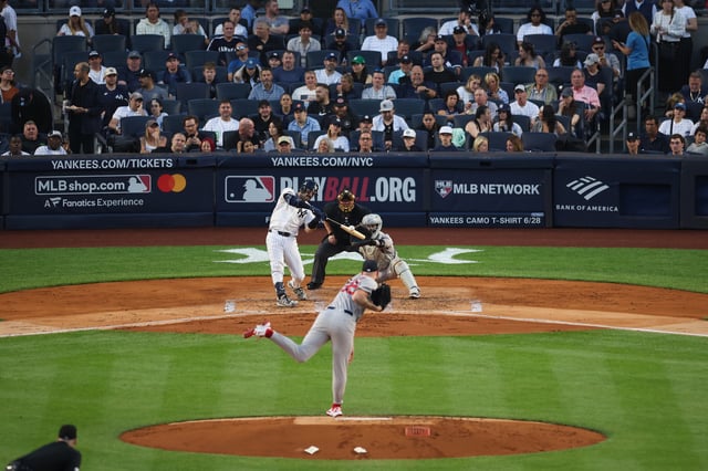 NEW YORK, NY - JUNE 07: Austin Wells #28 of the New York Yankees hits a three-run home run during the game against the Boston Red Sox at Yankee Stadium on June 7, 2025 in New York, New York.